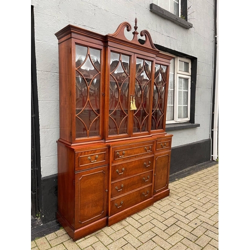 4 - A VERY FINE MAHOGANY BREAKFRONT LIBRARY SECRETAIRE BOOKCASE, to the top a swan neck pediment with fi... 