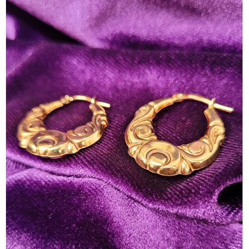 49 - A LOVELY PAIR OF 9CT YELLOW GOLD LOOP EARRINGS, with scrolling foliage design. Marked .375 gold. 2 x... 