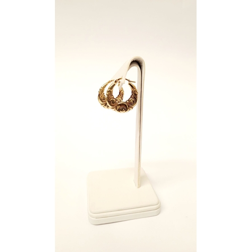 49 - A LOVELY PAIR OF 9CT YELLOW GOLD LOOP EARRINGS, with scrolling foliage design. Marked .375 gold. 2 x... 