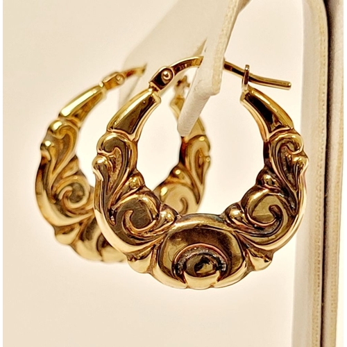 49 - A LOVELY PAIR OF 9CT YELLOW GOLD LOOP EARRINGS, with scrolling foliage design. Marked .375 gold. 2 x... 