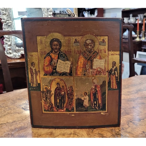 57 - A 19TH CENTURY ICON, tempura on panel. A beautiful antique piece in over all excellent condition; mi... 