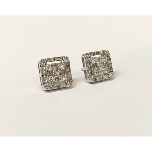 62 - A TIMELESS PAIR OF 18CT WHITE GOLD BAGUETTE CUT DIAMONDS STUD EARRINGS, with baguette and round cut ... 