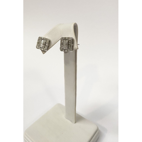 62 - A TIMELESS PAIR OF 18CT WHITE GOLD BAGUETTE CUT DIAMONDS STUD EARRINGS, with baguette and round cut ... 