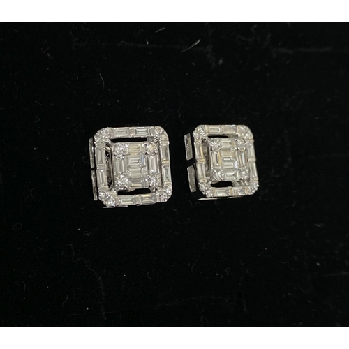 62 - A TIMELESS PAIR OF 18CT WHITE GOLD BAGUETTE CUT DIAMONDS STUD EARRINGS, with baguette and round cut ... 