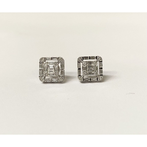 62 - A TIMELESS PAIR OF 18CT WHITE GOLD BAGUETTE CUT DIAMONDS STUD EARRINGS, with baguette and round cut ... 