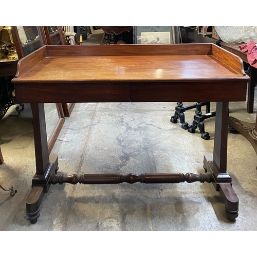 67 - AN EXCELLENT MAHOGANY SIDE TABLE, with three quarter gallery to top, two frieze drawers, standing on... 