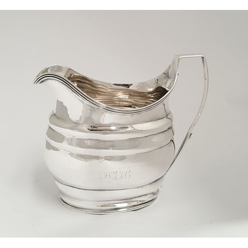 7 - A GEORGE III IRISH CORK SILVER CREAM JUG, Hallmarked Maker John Toleken, Cork c.1795. With square lo... 