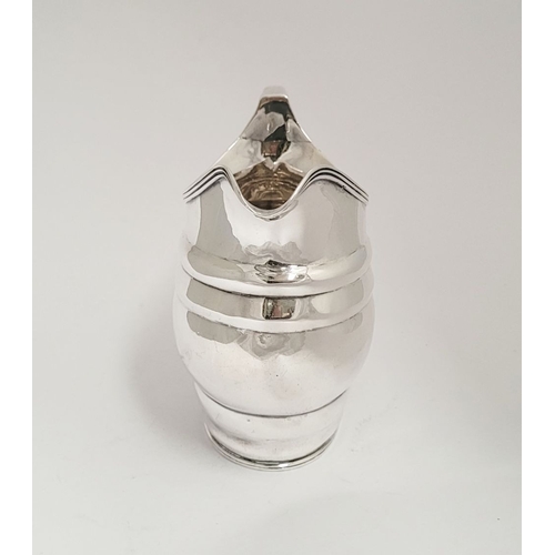 7 - A GEORGE III IRISH CORK SILVER CREAM JUG, Hallmarked Maker John Toleken, Cork c.1795. With square lo... 