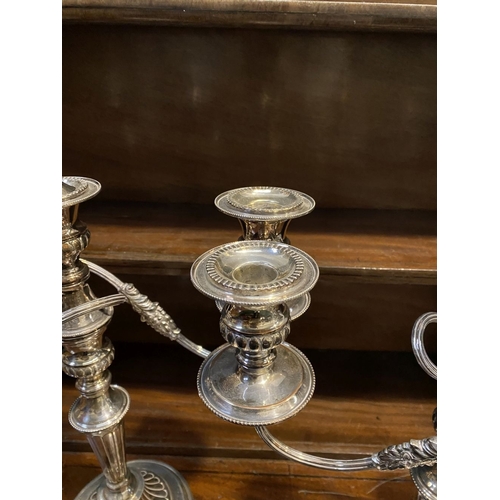 70 - PAIR OF DECORATIVE SHEFFIELD SILVER PLATED CANDLEABRA, each with three branches with scrolling flute... 