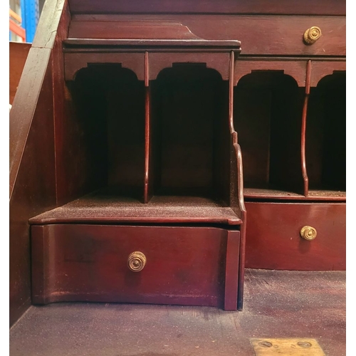 72 - A VERY GOOD QUALITY MAHOGANY FALL FRONT SECRETAIRE DESK, with a run of four graduated drawers to the... 