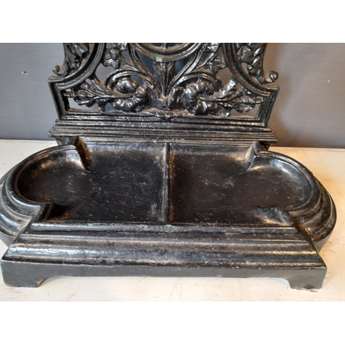 73 - AN EXCELLENT 20TH CENTURY CAST IRON UMBRELLA STAND, with decorative openwork panel to back featuring... 