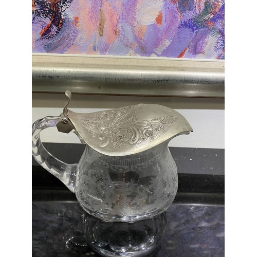 76 - A BEAUTIFUL ANTIQUE SILVER TOPPED ETCHED GLASS PITCHER, the silver top Marked 830, with beautiful fl... 