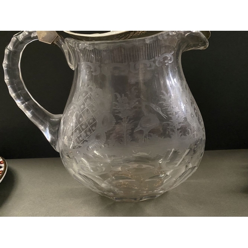 76 - A BEAUTIFUL ANTIQUE SILVER TOPPED ETCHED GLASS PITCHER, the silver top Marked 830, with beautiful fl... 