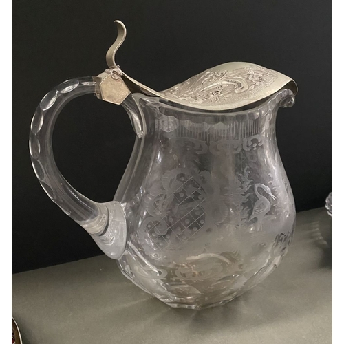 76 - A BEAUTIFUL ANTIQUE SILVER TOPPED ETCHED GLASS PITCHER, the silver top Marked 830, with beautiful fl... 