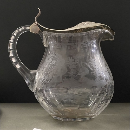 76 - A BEAUTIFUL ANTIQUE SILVER TOPPED ETCHED GLASS PITCHER, the silver top Marked 830, with beautiful fl... 