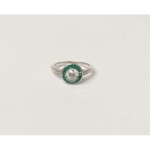 8 - AN ART DECO STYLE 18CT WHITE GOLD COLUMBIAN EMERALD AND DIAMOND TARGET RING, with central round bril... 