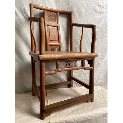 96 - A PAIR OF CHINESE HARDWOOD THRONE STYLE CHAIRS, each with carved detail to the back panels and under... 