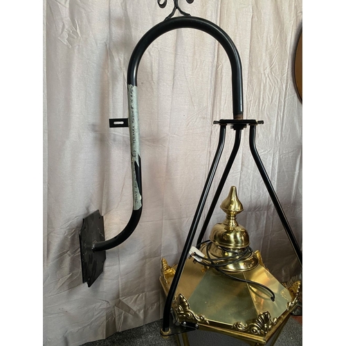 98 - A LARGE BRASS HANGING LANTERN, with black metal tri-bar supports/bracket, the lantern has frosted gl... 