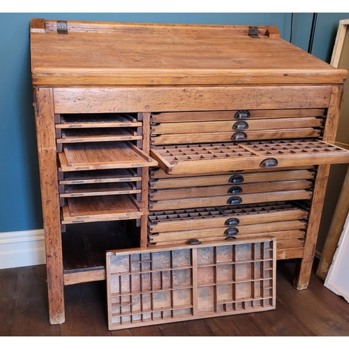 25 - AN ANTIQUE OAK DRAUGHTSMAN’S CABINET, or flat file cabinet, this expertly crafter piece has a lift t... 