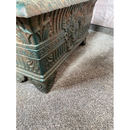 100 - A VICTORIAN CAST IRON GARDEN PLANTER, with tapered body, highly decorated with central panel surroun... 