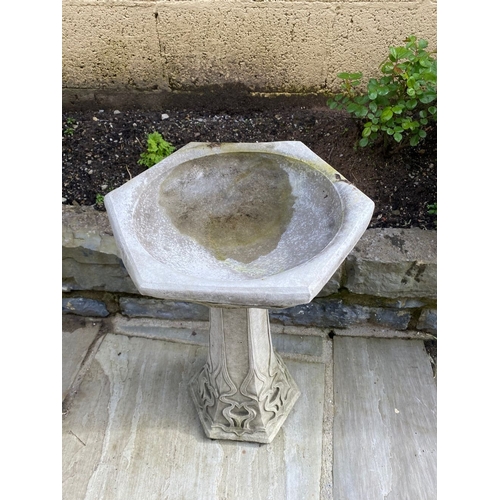 102 - A GOOD GOTHIC STYLE STONE GARDEN BIRD BATH, with hexagonal shaped top on tapered support with decora... 