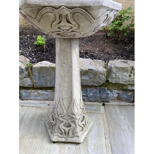 102 - A GOOD GOTHIC STYLE STONE GARDEN BIRD BATH, with hexagonal shaped top on tapered support with decora... 