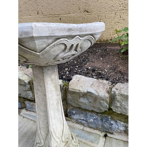 102 - A GOOD GOTHIC STYLE STONE GARDEN BIRD BATH, with hexagonal shaped top on tapered support with decora... 