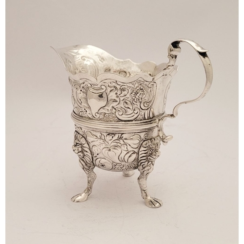 12 - A BEAUTIFUL GEORGE II IRISH CREAM JUG, Dublin, circa 1745. Maker’s initials for William Williams. De... 