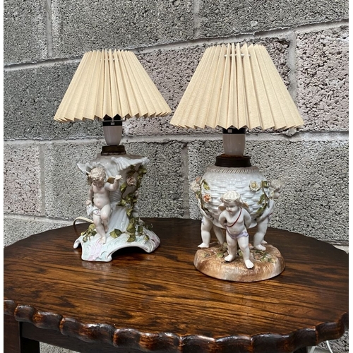 126 - TWO EARLY 20TH CENTURY GERMAN PORCELAIN TABLE LAMPS, (i) numbered and marked to base with double ove... 