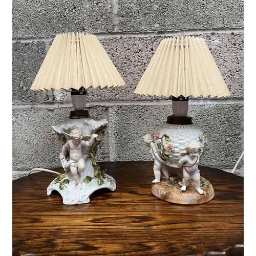 126 - TWO EARLY 20TH CENTURY GERMAN PORCELAIN TABLE LAMPS, (i) numbered and marked to base with double ove... 