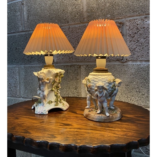 126 - TWO EARLY 20TH CENTURY GERMAN PORCELAIN TABLE LAMPS, (i) numbered and marked to base with double ove... 