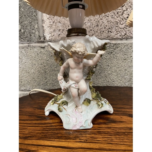 126 - TWO EARLY 20TH CENTURY GERMAN PORCELAIN TABLE LAMPS, (i) numbered and marked to base with double ove... 