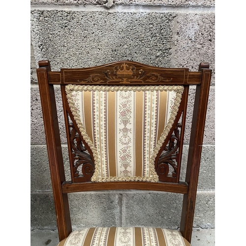 136 - A PAIR OF VICTORIAN ROSEWOOD INLAID NURSING CHAIRS, with upholstery to backrest surrounded by scroll... 