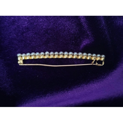 141 - A VINTAGE 18CT YELLOW GOLD & PEARL BAR BROOCH, 5cm long.