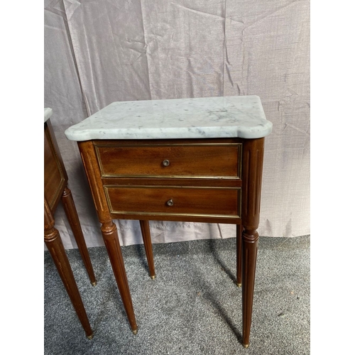 15 - A PAIR OF MARBLE TOPPED MAHOGANY TWO DRAWER SIDE TABLES, shaped marble tops above two drawers with b... 