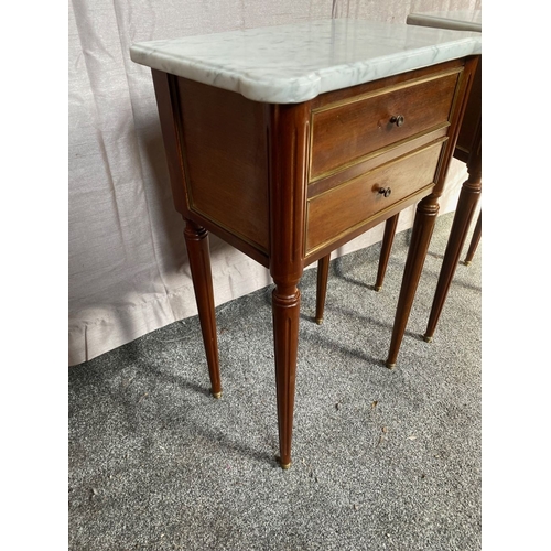 15 - A PAIR OF MARBLE TOPPED MAHOGANY TWO DRAWER SIDE TABLES, shaped marble tops above two drawers with b... 