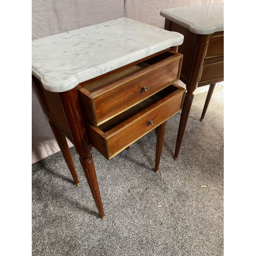 15 - A PAIR OF MARBLE TOPPED MAHOGANY TWO DRAWER SIDE TABLES, shaped marble tops above two drawers with b... 