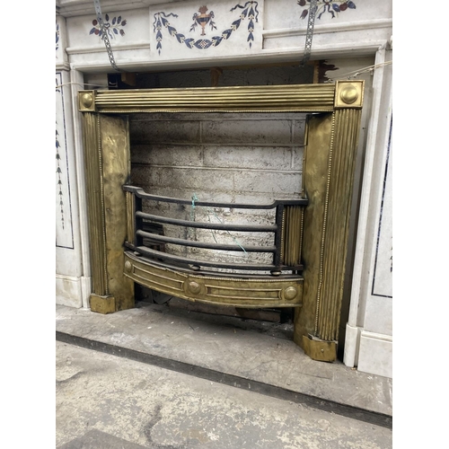 151 - AN EXCELLENT GEORGE III BRASS FIRE GRATE, the moulded brass frame with roundels to each corner, we w... 