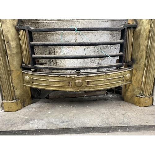 151 - AN EXCELLENT GEORGE III BRASS FIRE GRATE, the moulded brass frame with roundels to each corner, we w... 