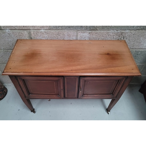 156 - A MAHOGANY INLAID TWO DOOR SIDE BOARD / BUFFET TABLE, to the front are a pair of cabinets; each with... 