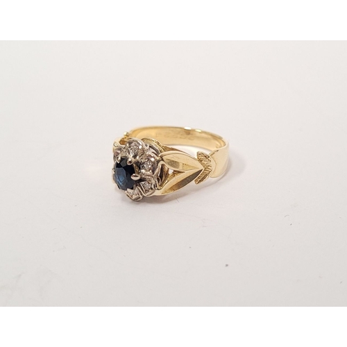 17 - A BEAUTIFUL VINTAGE 18CT YELLOW GOLD SAPPHIRE & DIAMOND DRESS RING, with a central oval shaped dark ... 