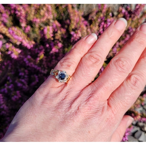 17 - A BEAUTIFUL VINTAGE 18CT YELLOW GOLD SAPPHIRE & DIAMOND DRESS RING, with a central oval shaped dark ... 