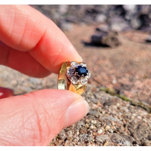 17 - A BEAUTIFUL VINTAGE 18CT YELLOW GOLD SAPPHIRE & DIAMOND DRESS RING, with a central oval shaped dark ... 