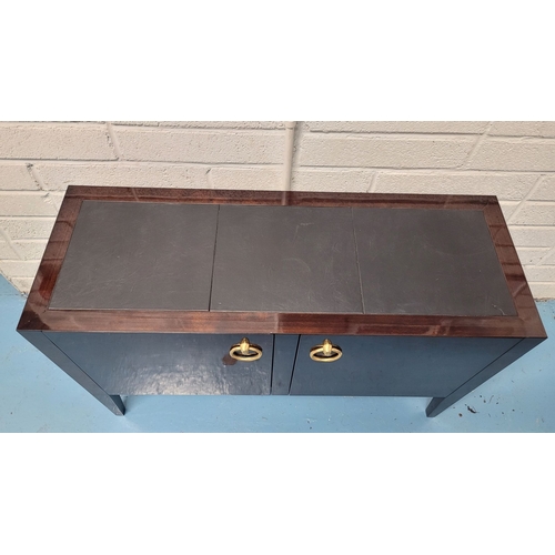 18 - A VERY GOOD QUALITY PORTA ROMANA TWO DOOR CONSOLE CHEST, with triple leather inset to the top, a pai... 