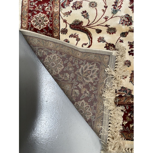 180 - AN EXCELLENT SILK & WOOL ‘ZIEGLER’ PATTERN RUG, in beautiful deep red and cream tones in the ‘Ziegle... 