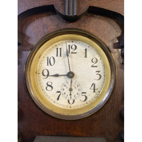 195 - A FINE MAHOGANY MANTLE CLOCK, the dial with subsidiary second dial, within highly carved mahogany fr... 