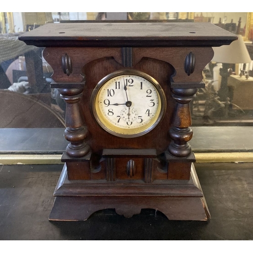 195 - A FINE MAHOGANY MANTLE CLOCK, the dial with subsidiary second dial, within highly carved mahogany fr... 