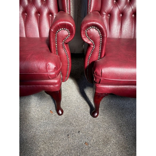 2 - A GOOD PAIR OF LEATHER CHESTERFIELD WINGBACK ARMCHAIRS, with deep red leather button back upholstery... 