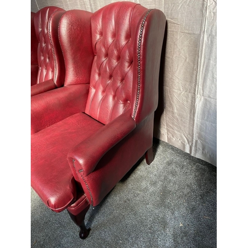 2 - A GOOD PAIR OF LEATHER CHESTERFIELD WINGBACK ARMCHAIRS, with deep red leather button back upholstery... 