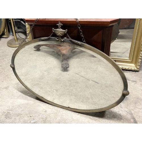 202 - A FINE OVAL BEVELLED GLASS ART DECO STYLE MIRROR, the simple frame with urn mount to top and mounts ... 